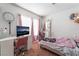 A bedroom with pink carpet, vanity and tv at 988 Flapjack Dr, Henderson, NV 89014