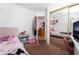 Cozy bedroom featuring plush bedding, ample storage, and a cheerful, personalized decor at 988 Flapjack Dr, Henderson, NV 89014