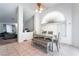 Bright dining room area featuring tile floors and a table with seating for six at 988 Flapjack Dr, Henderson, NV 89014