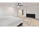 Spacious main bedroom featuring neutral walls, a modern ceiling fan, and contemporary decor at 10190 Natural Anchor St, Las Vegas, NV 89166