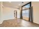 Bright dining room with a large window and views of the fenced yard at 10212 Donald Weese Ct, Las Vegas, NV 89129
