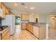 Functional kitchen with granite countertops and ample cabinet space at 10212 Donald Weese Ct, Las Vegas, NV 89129