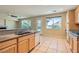 Well-lit kitchen featuring granite countertops and stainless steel appliances at 10212 Donald Weese Ct, Las Vegas, NV 89129