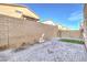 Backyard includes a fountain, an artificial grass area, and stone pavers at 10940 Oregano Ave, Las Vegas, NV 89166