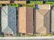 Aerial of roof tops shows a grey roof, a tile roof, and a composite roof from above with desert landscaping at 10972 Nicholas Jay Ave, Las Vegas, NV 89166