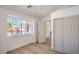 Bright bedroom with a window view, closet, and modern floors at 1144 Calico Ridge Dr, Henderson, NV 89011