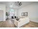 Bright living room features lots of natural light, modern décor, and hardwood floors at 1144 Calico Ridge Dr, Henderson, NV 89011