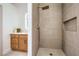 Modern shower with tile walls, niche, and a rainfall shower head at 1144 Calico Ridge Dr, Henderson, NV 89011