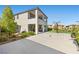 Expansive backyard featuring a basketball court, manicured landscaping, and a covered patio at 12413 Alpenglow Ct, Las Vegas, NV 89138