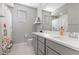 Bathroom featuring a double sink vanity with modern fixtures and a shower-tub combination at 12413 Alpenglow Ct, Las Vegas, NV 89138