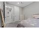 Inviting bedroom with soft carpet, a view into another room, and plenty of closet space at 12413 Alpenglow Ct, Las Vegas, NV 89138