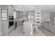 Contemporary kitchen with stainless steel appliances, a spacious island, and open layout concept at 12413 Alpenglow Ct, Las Vegas, NV 89138