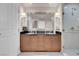 This bathroom offers a double vanity, shower and is brightly lit at 145 E Harmon Ave # 3801&3803, Las Vegas, NV 89109