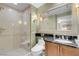 Elegant bathroom with a glass-enclosed shower and a vanity with countertop at 145 E Harmon Ave # 3801&3803, Las Vegas, NV 89109