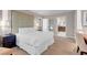 Inviting bedroom featuring a comfortable king-size bed with a padded headboard and a view into the bathroom at 145 E Harmon Ave # 3801&3803, Las Vegas, NV 89109