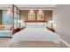 Elegant bedroom boasts a comfy sofa, a glass coffee table, and soft lighting for a relaxed atmosphere at 145 E Harmon Ave # 3801&3803, Las Vegas, NV 89109