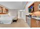 This bedroom boasts a bed, bench, and convenient kitchenette at 145 E Harmon Ave # 3801&3803, Las Vegas, NV 89109