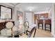 Bright dining area with table, chairs, and views into the kitchen space at 145 E Harmon Ave # 3801&3803, Las Vegas, NV 89109