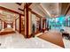 Hotel hallway with wood trim, signage, large windows, and stylish interior finishes at 145 E Harmon Ave # 3801&3803, Las Vegas, NV 89109