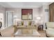 Comfortable living room area with cozy seating, lamps, and an adjacent doorway at 145 E Harmon Ave # 3801&3803, Las Vegas, NV 89109