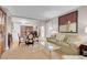 Cozy living room with stylish furnishings, comfortable seating, and adjacent dining area at 145 E Harmon Ave # 3801&3803, Las Vegas, NV 89109