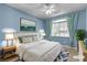 Beautifully staged bedroom featuring a comfortable bed, stylish décor, and lots of natural light at 1532 Via Cassia, Henderson, NV 89052