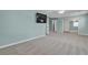 An expansive bedroom with a TV, walk-in closet, and neutral carpeting, creating a comfortable retreat at 1532 Via Cassia, Henderson, NV 89052