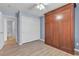 A well-lit bedroom with a Murphy bed and a closet, offering ample storage and a clean aesthetic at 1532 Via Cassia, Henderson, NV 89052