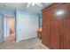 Neutral secondary bedroom with built-in wardrobe, and a secondary door leading to the bathroom at 1532 Via Cassia, Henderson, NV 89052