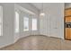 Bright dining area with large windows, tiled floor, and ample natural light at 1532 Via Cassia, Henderson, NV 89052