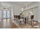 Bright dining room showcasing elegant decor and a view of the front entrance at 1532 Via Cassia, Henderson, NV 89052