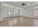 Expansive living room with tile flooring and ample natural light at 1532 Via Cassia, Henderson, NV 89052
