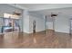 Open living room with hardwood floors with sliding doors to the outdoor patio at 1532 Via Cassia, Henderson, NV 89052