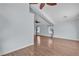 Open living room with hardwood floors and neutral paint with natural light at 1532 Via Cassia, Henderson, NV 89052