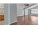 Bright living room with hardwood floors, vaulted ceiling, and large windows at 1532 Via Cassia, Henderson, NV 89052