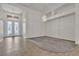 Empty living room featuring high ceilings and a view of the front entrance at 1532 Via Cassia, Henderson, NV 89052