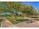 Scenic park with walking paths, green lawns, and mature trees offering a peaceful outdoor space at 1532 Via Cassia, Henderson, NV 89052