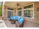 Cozy covered patio with comfortable seating, offering a relaxing outdoor living space at 1532 Via Cassia, Henderson, NV 89052