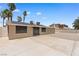 Spacious backyard featuring a concrete patio area, a wall, and low-maintenance landscaping, great for outdoor living at 1655 E Hacienda Ave, Las Vegas, NV 89119
