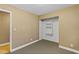 Simple bedroom with closet and neutral tones, awaiting your personal touch at 1655 E Hacienda Ave, Las Vegas, NV 89119