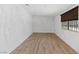 Bedroom featuring wood floors, neutral walls, and natural light at 1655 E Hacienda Ave, Las Vegas, NV 89119