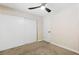 Bedroom featuring carpet, closet space, and a ceiling fan at 1655 E Hacienda Ave, Las Vegas, NV 89119