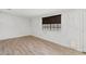 Bedroom features wood floors and natural light from the window at 1655 E Hacienda Ave, Las Vegas, NV 89119