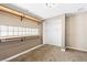 Carpeted bedroom with built in shelving and closet space at 1655 E Hacienda Ave, Las Vegas, NV 89119