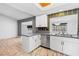An open kitchen featuring quartz countertops and stainless appliances at 1655 E Hacienda Ave, Las Vegas, NV 89119