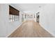 Open-concept living area with wood floors and natural light at 1655 E Hacienda Ave, Las Vegas, NV 89119