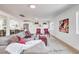 Beautiful open-concept living space featuring modern finishes, natural light, and seamless flow to the kitchen at 1731 Sherwin Ln, Las Vegas, NV 89156