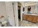 Charming bathroom features a double sink vanity and tile flooring, offering comfort and style at 2598 Fountain Ave, Pahrump, NV 89048