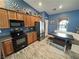 Charming kitchen with stainless steel appliances, ample cabinetry, and a cozy breakfast nook at 2598 Fountain Ave, Pahrump, NV 89048
