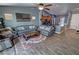 Cozy living room with an island view, complete with comfortable seating, stylish decor, and wood-look flooring at 2598 Fountain Ave, Pahrump, NV 89048